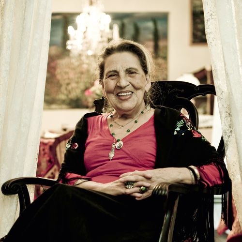 Portrait photo of a seated woman